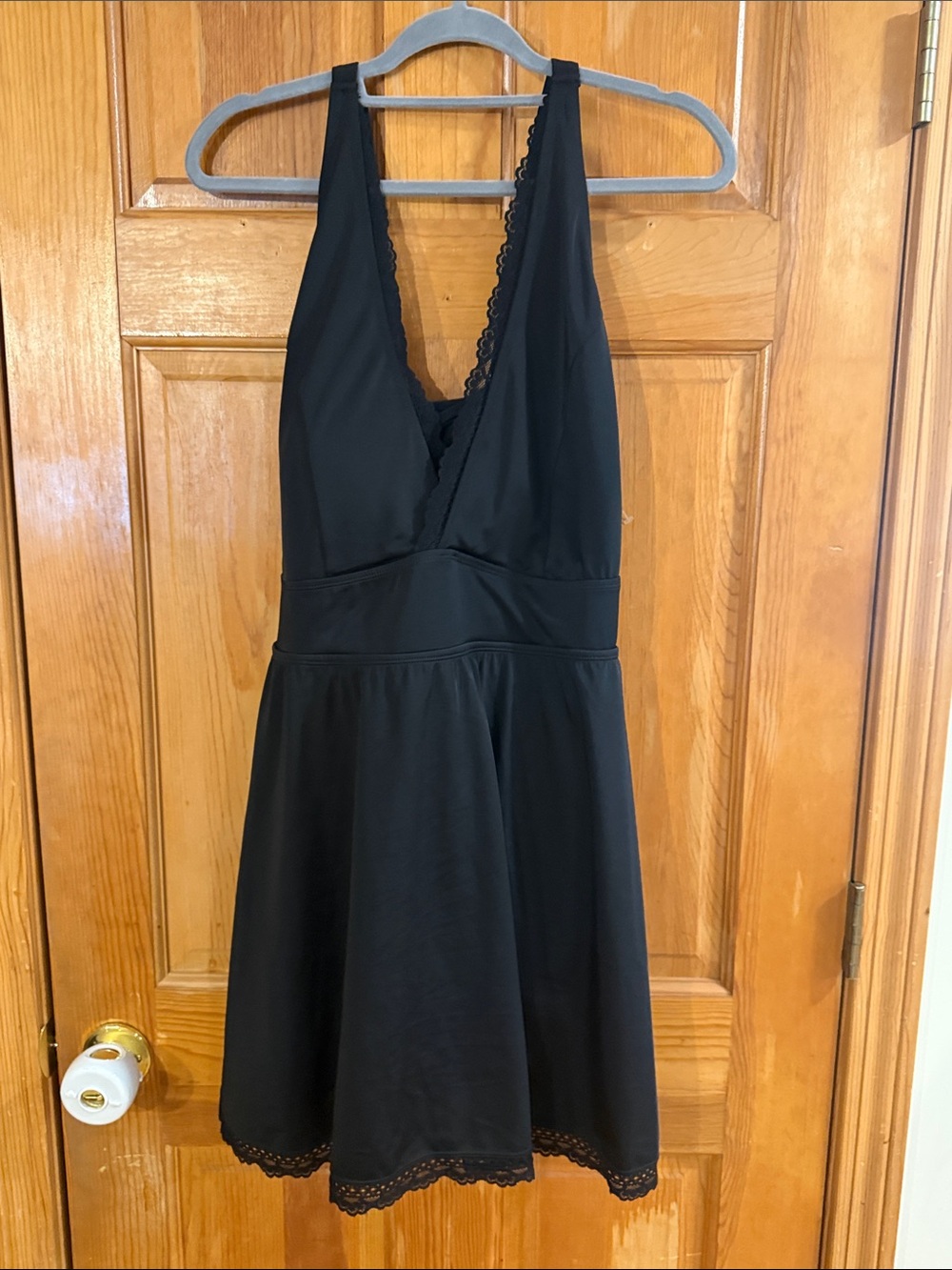 NWOT Torrid black lace trim wireless swim dress with briefs size 4 .